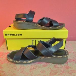 London navy blue camo crisscross sandals- size 39/US 9